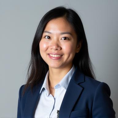 Professional headshot of Chloe Kim, a corporate travel manager.